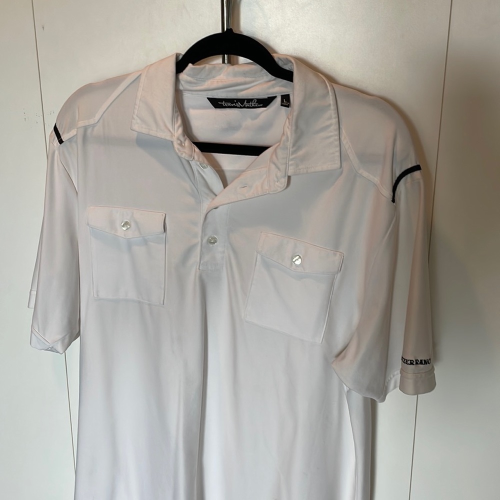 EUC Travis Mathew golf shirt. White w/ black accents.
